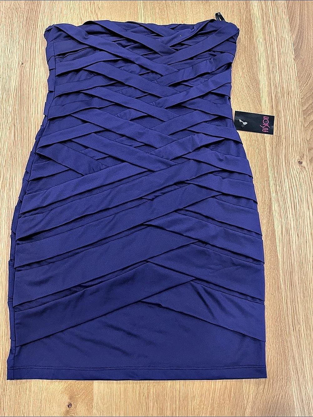 Nikibiki Mini Dress in Purple
Size Medium NWT